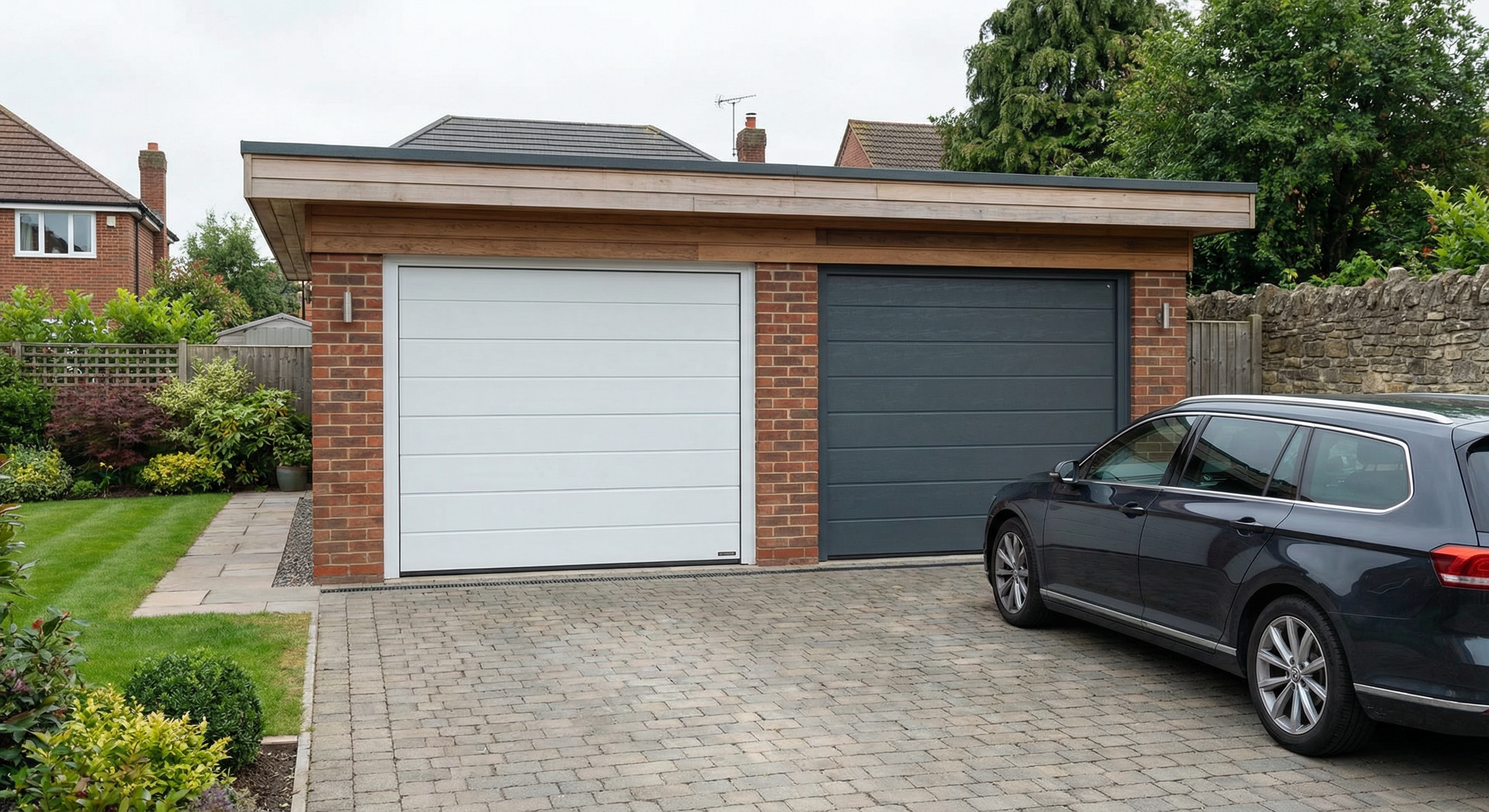 Double-bay garage with sectional doors